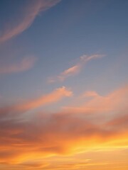 Fototapeta premium Warm sunset sky with wispy clouds and gentle blue hue, peaceful, || sky