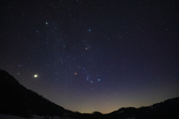 Orion constellation, zodiacal light and Milky Way stars on a dark countryside skies. © astrosystem
