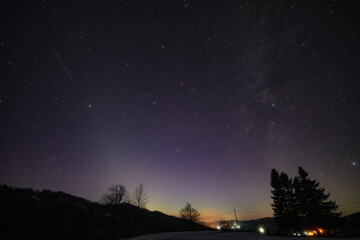 Orion constellation, zodiacal light and Milky Way stars on a dark countryside skies. © astrosystem