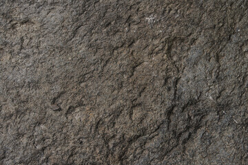 Rough grey granite rock surface texture natural stone background © EkoPriyatno