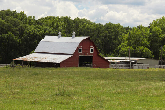 Red Barn located on Farm in East Texas with Blue Sky, Overton TX
