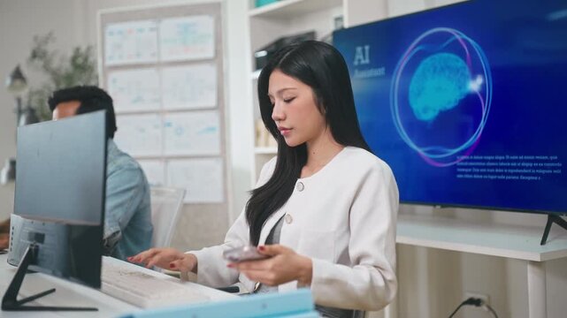 Businesswoman using AI voice assistant on smartphone in modern high-tech office.