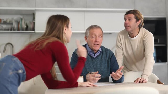 Adult children argue with each other and show their elderly father how to fill out documents correctly 