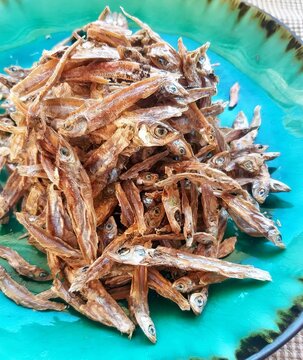 Traditional Zambian kapenta, small freshwater fish cooked with tomatoes, onions, and spices. A popular fish dish commonly served with nshima in Zambia.
