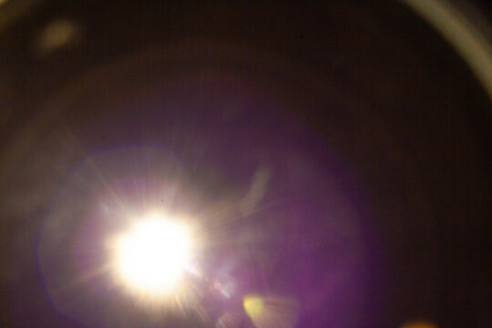 Sun flare on the black background
