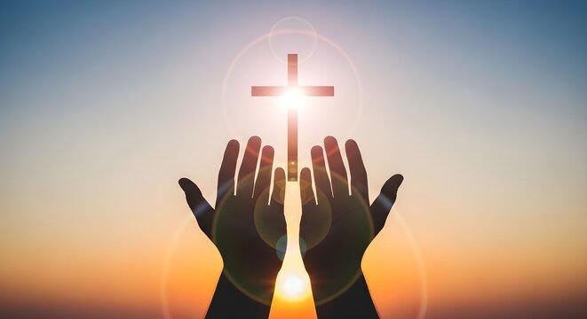 Christian prayer and worship concept photo. Human hands raised in praise toward a glowing holy cross silhouette against sunset sky. Spiritual faith, devotion, and religious belief.