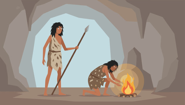 Prehistoric cavemen in stone age cave using a spear for hunting and sitting near a burning campfire for warmth.