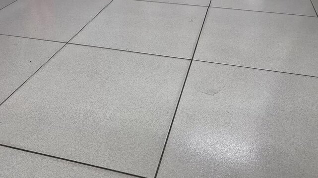 Grey ceramic tiled floor texture background