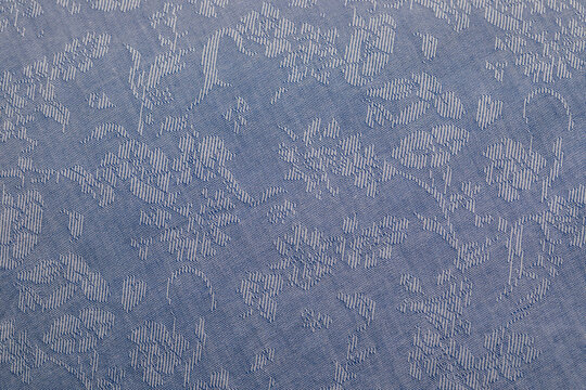 light blue floral jacquard fabric close up