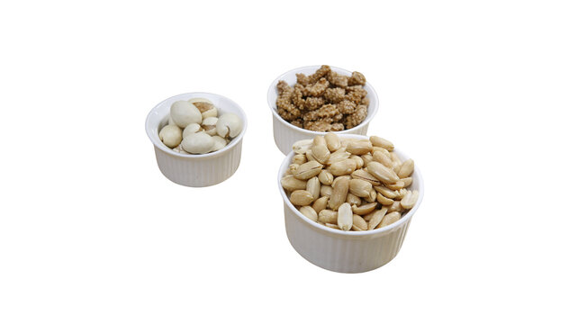 Three small bowls filled with a variety of raw nuts and legumes mixed nuts nut snack protein food vegan food snack time plant based energy food cooking ingredients baking ingredients