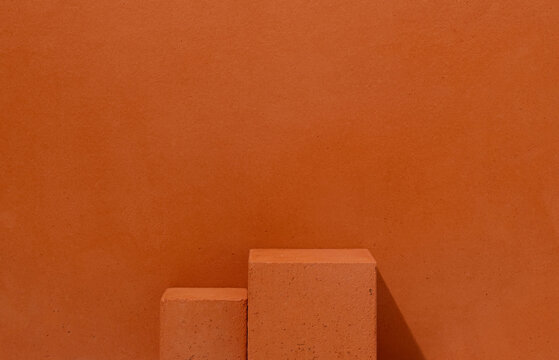 Product Presentation Scene made with Two Terracotta Cube Podiums on Monochrome Terracotta Background