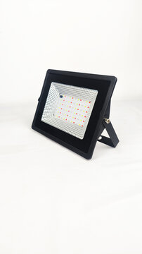 small rectangular LED floodlight fixture, showcasing its compact casing and bright energy-efficient diode panel designed for modern indoor and outdoor illumination