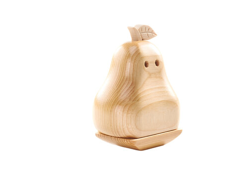 Charming handcrafted wooden pear object with a carved leaf and subtle eye details isolated on a transparent background a minimalist natural design element for creative projects and home decor