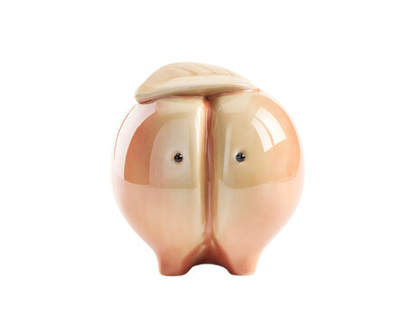 Glossy ceramic peach shaped decorative object with a whimsical design and small black eyes isolated on a transparent background a playful and cute element charming featuring delightful