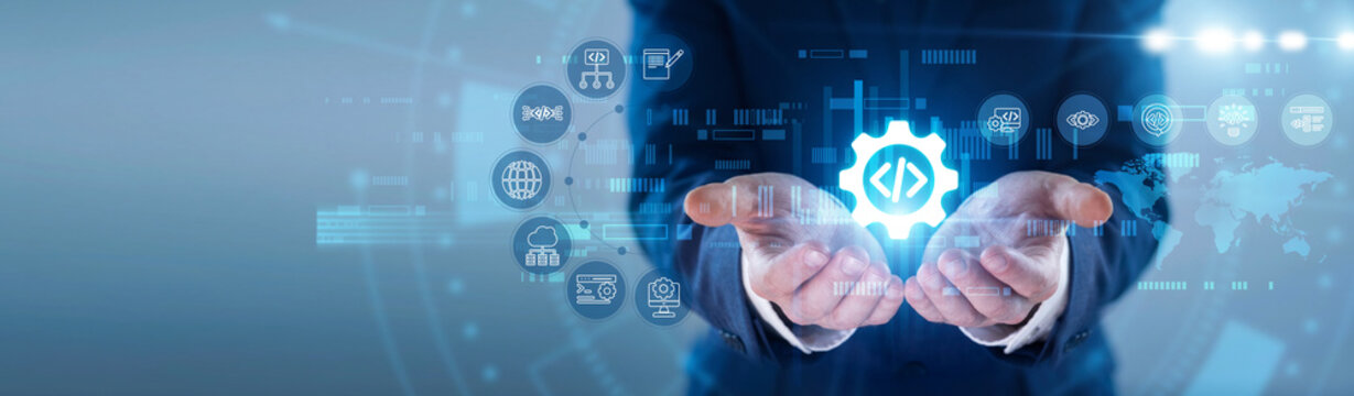 Developer hands hold glowing SOFTWARE DEVELOPMENT icon. Programmer coding digital tools, building desktop enterprise applications on futuristic virtual screen interface. Concept of system engineering.