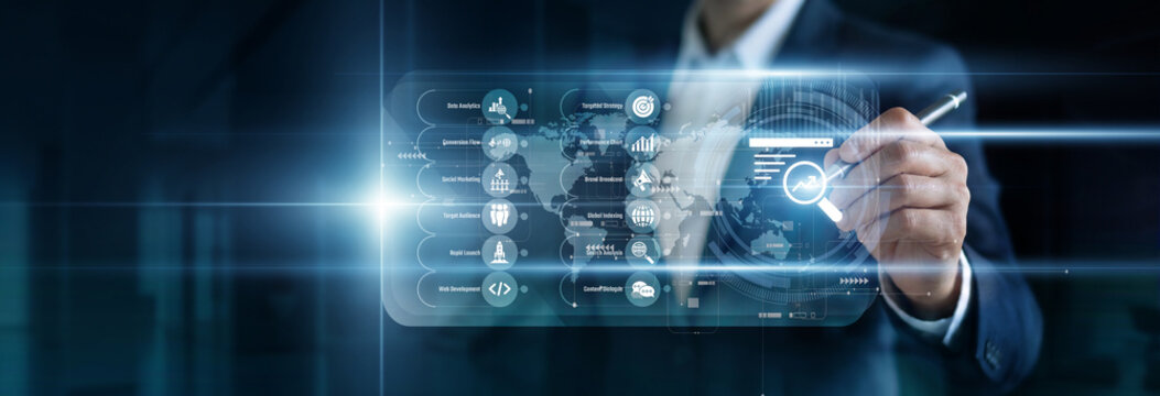 Digital marketer analyzing website traffic, keyword rankings, and backlink health on a virtual screen. Refining SEO strategies to boost search engine visibility and drive organic website growth.