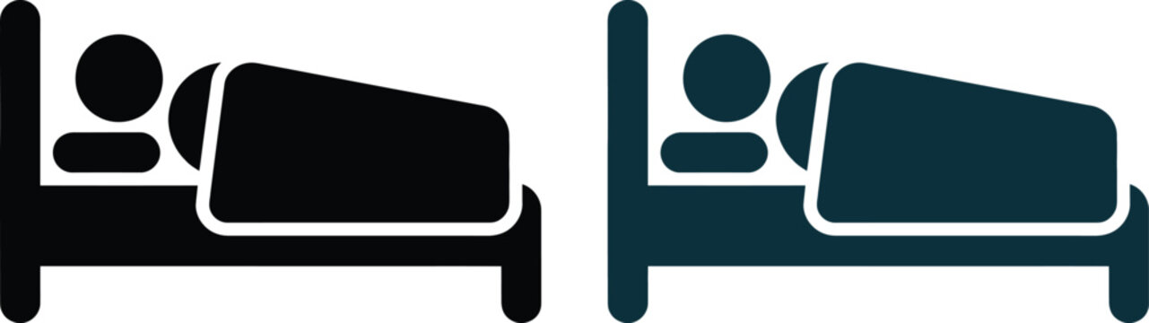 Two single beds with pillows in a simple room