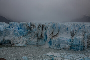 Perito Moreno Dramatic view of a glacier calving ice into cold arctic waters during a global warming event © vaclav
