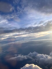 Obraz premium clouds over the sky (looking from the airplane)