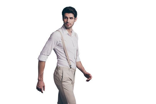 Profile side photo of charming gorgeous man walk stare copyspace attract women wear stylish clothing isolated over grey color background