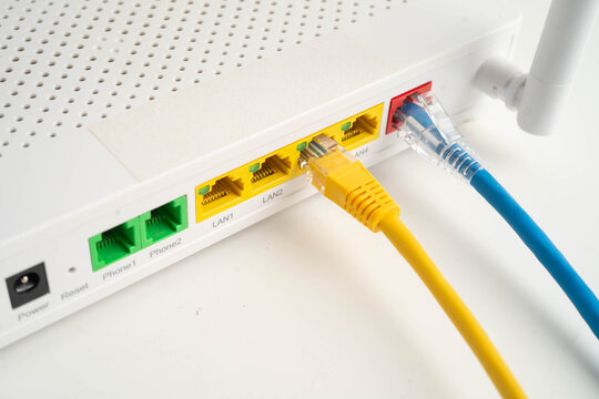 Ethernet cable with wireless router connect to internet service provider network.