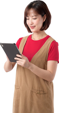Asian woman using tablet with gentle smile wearing red shirt and brown apron isolated on transparent background