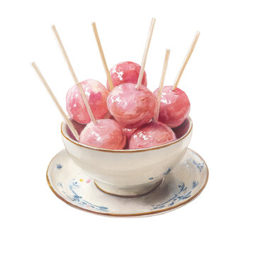 Candy apples are arranged in a white bowl with wooden sticks on a table. The apples are a bright pink color
