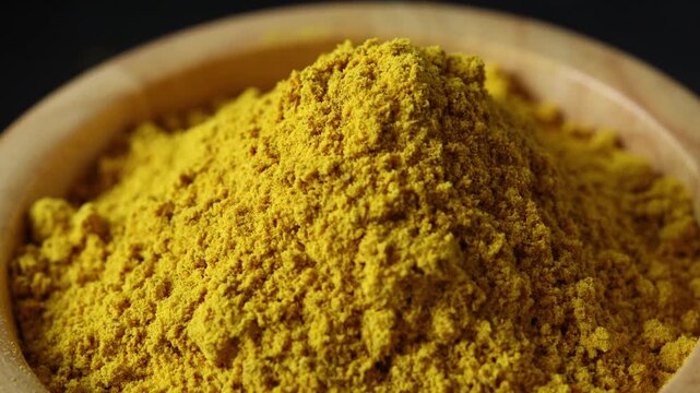Turmeric Powder in a Bowl