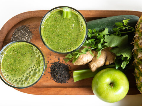 Fresh Green Juice with Apple Pineapple Ginger Celery and Chia Seeds