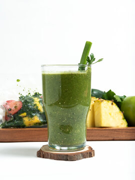 Green Smoothie With Ice, Pineapple and Fresh Herbs