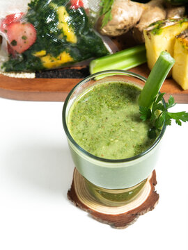 Green Smoothie With Ice, Pineapple and Fresh Herbs