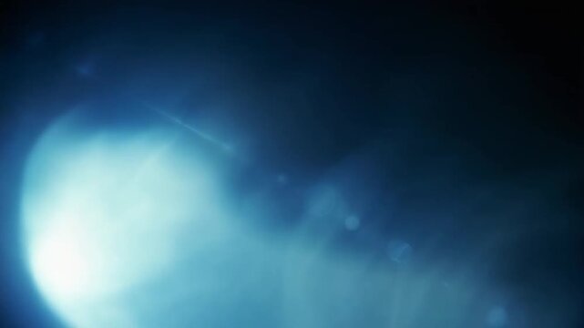 Blue abstract light flare and optical lens effect video background