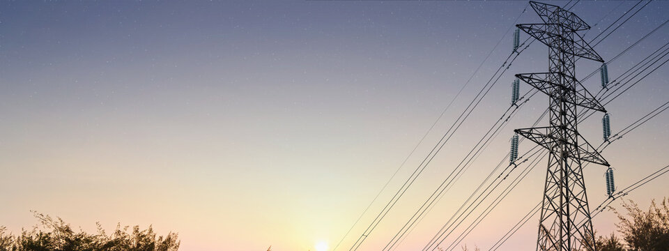 High-voltage electricity transmission pylon against a twilight sky transitioning to a starry night, symbolizing power infrastructure and energy distribution. Concept of the electricity energy industry