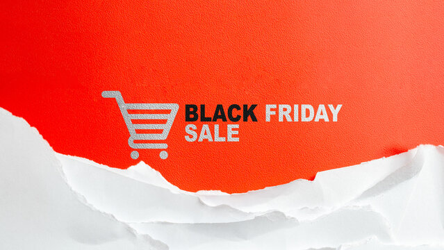 Minimalist Black Friday sale banner with shopping cart icon on torn red paper background. Concept of Black Friday