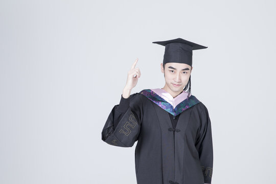 ** Graduation Pose Confident Young Graduate
