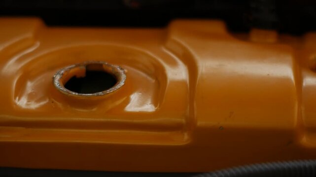 Opening a Car Engine Oil Filler Cap