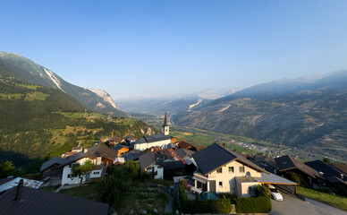 Obraz premium Mountain forest landscape viewed from wooden terrace