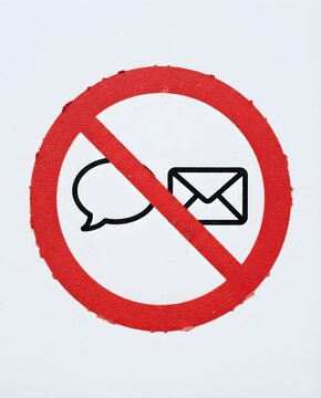 A red prohibition sign with a diagonal slash crossing out a chat bubble and an email envelope icon. Concept of no communication, silence, and isolation.