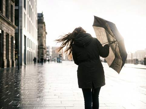 pluie et vent avec un parapluie