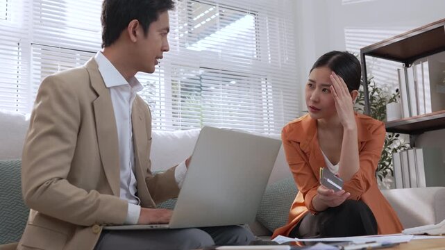 Financial advisor meeting with client for wealth planning consultation, discussing finance, investment, insurance, notes, and paperwork while creating thoughtful strategy, trust, guidance