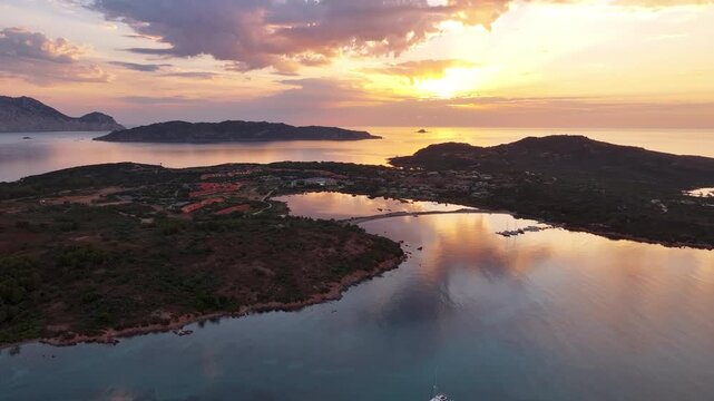 Aerial view of sea bay and sunrise over Capo Coda Cavallo, Sardinia