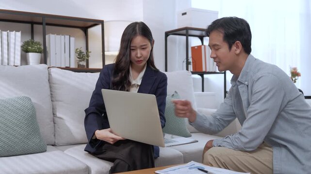 Financial Advisor Wealth Planning Consultation With Client Reviewing Investment Documents And Finance Guidance During Professional Office Meeting For Confident Decision Making