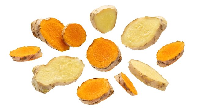 A vibrant arrangement of sliced turmeric and ginger roots, showcasing their rich colors and earthy textures