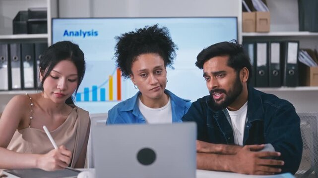 Diverse Business Team Having Video Call with Client on Laptop in Office.