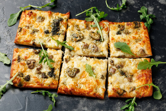 Stonebaked Flatbread Mushroom Pizza with Cheese and Arugula