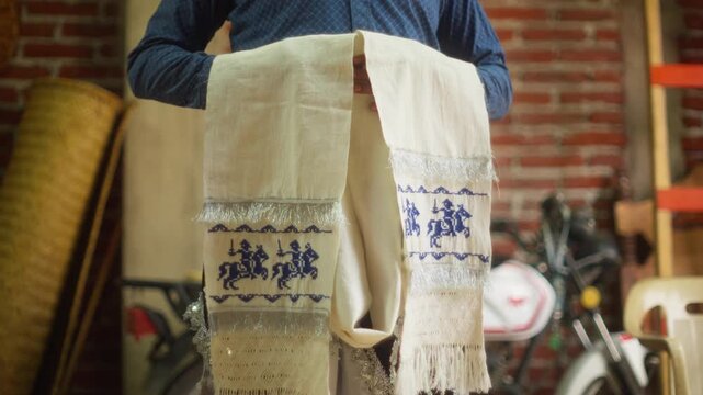 Embroidered ceremonial sash depicts mounted riders for Saint Santiago ritual in Angahuan