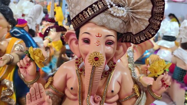 06 September 2026, Newly made idols of the God known as Ganesha or Ganapati for sale at a shop on the eve of Ganesh festival in Pune, India.
