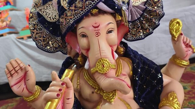 06 September 2026, Newly made idols of the God known as Ganesha or Ganapati for sale at a shop on the eve of Ganesh festival in Pune, India.