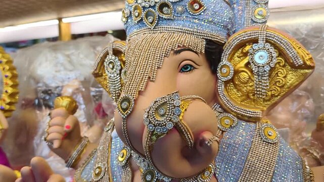 06 September 2026, Newly made idols of the God known as Ganesha or Ganapati for sale at a shop on the eve of Ganesh festival in Pune, India.