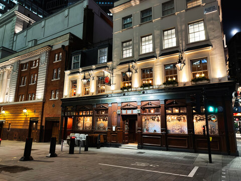 Duke of York pub exterior at night in London, UK illuminated historic tavern on quiet city street